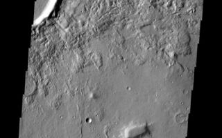 <h1>PIA10859:  Tempe Terra</h1><div class="PIA10859" lang="en" style="width:575px;text-align:left;margin:auto;background-color:#000;padding:10px;max-height:150px;overflow:auto;"><p><a href="/figures/PIA10859_fig1.jpg"></a><br><b>Context image for PIA10859<br />Tempe Terra</b></p><p>The top of this VIS image shows several of the many channels located on the eastern margin of Tempe Terra.<p>Image information: VIS instrument. Latitude 42.6N, Longitude 304.3E. 19 meter/pixel resolution.</p><p>Please see the <a href="http://themis.asu.edu/terms" target="_blank">THEMIS Data Citation Note</a> for details on crediting THEMIS images.</p><p>Note: this THEMIS visual image has not been radiometrically nor geometrically calibrated for this preliminary release. An empirical correction has been performed to remove instrumental effects. A linear shift has been applied in the cross-track and down-track direction to approximate spacecraft and planetary motion. Fully calibrated and geometrically projected images will be released through the Planetary Data System in accordance with Project policies at a later time.</p><p>NASA's Jet Propulsion Laboratory manages the 2001 Mars Odyssey mission for NASA's Office of Space Science, Washington, D.C. The Thermal Emission Imaging System (THEMIS) was developed by Arizona State University, Tempe, in collaboration with Raytheon Santa Barbara Remote Sensing. The THEMIS investigation is led by Dr. Philip Christensen at Arizona State University. Lockheed Martin Astronautics, Denver, is the prime contractor for the Odyssey project, and developed and built the orbiter. Mission operations are conducted jointly from Lockheed Martin and from JPL, a division of the California Institute of Technology in Pasadena.<br /><br /><a href="http://photojournal.jpl.nasa.gov/catalog/PIA10859" onclick="window.open(this.href); return false;" title="Voir l'image 	 PIA10859:  Tempe Terra	  sur le site de la NASA">Voir l'image 	 PIA10859:  Tempe Terra	  sur le site de la NASA.</a></div>
