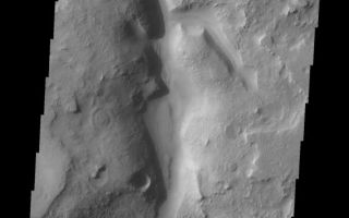 <h1>PIA10864:  Auqakuh Vallis</h1><div class="PIA10864" lang="en" style="width:561px;text-align:left;margin:auto;background-color:#000;padding:10px;max-height:150px;overflow:auto;"><p><a href="/figures/PIA10864_fig1.jpg"></a><br><b>Context image for PIA10864<br />Auqakuh Vallis</b></p><p>This VIS image shows a small portion of Auqakuh Vallis. Several tributaries enter the main channel in the center and upper portions of the image.<p>Image information: VIS instrument. Latitude 30.4N, Longitude 66.6E. 19 meter/pixel resolution.</p><p>Please see the <a href="http://themis.asu.edu/terms" target="_blank">THEMIS Data Citation Note</a> for details on crediting THEMIS images.</p><p>Note: this THEMIS visual image has not been radiometrically nor geometrically calibrated for this preliminary release. An empirical correction has been performed to remove instrumental effects. A linear shift has been applied in the cross-track and down-track direction to approximate spacecraft and planetary motion. Fully calibrated and geometrically projected images will be released through the Planetary Data System in accordance with Project policies at a later time.</p><p>NASA's Jet Propulsion Laboratory manages the 2001 Mars Odyssey mission for NASA's Office of Space Science, Washington, D.C. The Thermal Emission Imaging System (THEMIS) was developed by Arizona State University, Tempe, in collaboration with Raytheon Santa Barbara Remote Sensing. The THEMIS investigation is led by Dr. Philip Christensen at Arizona State University. Lockheed Martin Astronautics, Denver, is the prime contractor for the Odyssey project, and developed and built the orbiter. Mission operations are conducted jointly from Lockheed Martin and from JPL, a division of the California Institute of Technology in Pasadena.<br /><br /><a href="http://photojournal.jpl.nasa.gov/catalog/PIA10864" onclick="window.open(this.href); return false;" title="Voir l'image 	 PIA10864:  Auqakuh Vallis	  sur le site de la NASA">Voir l'image 	 PIA10864:  Auqakuh Vallis	  sur le site de la NASA.</a></div>