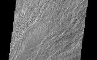 <h1>PIA10871:  Olympus Mons</h1><div class="PIA10871" lang="en" style="width:555px;text-align:left;margin:auto;background-color:#000;padding:10px;max-height:150px;overflow:auto;"><p><a href="/figures/PIA10871_fig1.jpg"></a><br><b>Context image for PIA10871<br />Olympus Mons</b></p><p>This VIS image shows numerous lava flows on the northern flank of Olympus Mons.<p>Image information: VIS instrument. Latitude 21.3N, Longitude 229.3E. 18 meter/pixel resolution.</p><p>Please see the <a href="http://themis.asu.edu/terms" target="_blank">THEMIS Data Citation Note</a> for details on crediting THEMIS images.</p><p>Note: this THEMIS visual image has not been radiometrically nor geometrically calibrated for this preliminary release. An empirical correction has been performed to remove instrumental effects. A linear shift has been applied in the cross-track and down-track direction to approximate spacecraft and planetary motion. Fully calibrated and geometrically projected images will be released through the Planetary Data System in accordance with Project policies at a later time.</p><p>NASA's Jet Propulsion Laboratory manages the 2001 Mars Odyssey mission for NASA's Office of Space Science, Washington, D.C. The Thermal Emission Imaging System (THEMIS) was developed by Arizona State University, Tempe, in collaboration with Raytheon Santa Barbara Remote Sensing. The THEMIS investigation is led by Dr. Philip Christensen at Arizona State University. Lockheed Martin Astronautics, Denver, is the prime contractor for the Odyssey project, and developed and built the orbiter. Mission operations are conducted jointly from Lockheed Martin and from JPL, a division of the California Institute of Technology in Pasadena.<br /><br /><a href="http://photojournal.jpl.nasa.gov/catalog/PIA10871" onclick="window.open(this.href); return false;" title="Voir l'image 	 PIA10871:  Olympus Mons	  sur le site de la NASA">Voir l'image 	 PIA10871:  Olympus Mons	  sur le site de la NASA.</a></div>