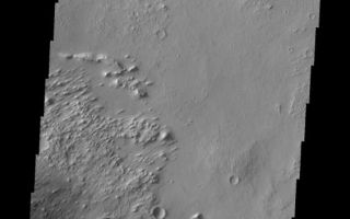 <h1>PIA10875:  Pasteur Crater</h1><div class="PIA10875" lang="en" style="width:564px;text-align:left;margin:auto;background-color:#000;padding:10px;max-height:150px;overflow:auto;"><p><a href="/figures/PIA10875_fig1.jpg"></a><br><b>Context image for PIA10875<br />Pasteur Crater</b></p><p>Small, isolated, dark dunes are located on material deposited within Pasteur Crater.<p>Image information: VIS instrument. Latitude 19.5N, Longitude 24.7E. 18 meter/pixel resolution.</p><p>Please see the <a href="http://themis.asu.edu/terms" target="_blank">THEMIS Data Citation Note</a> for details on crediting THEMIS images.</p><p>Note: this THEMIS visual image has not been radiometrically nor geometrically calibrated for this preliminary release. An empirical correction has been performed to remove instrumental effects. A linear shift has been applied in the cross-track and down-track direction to approximate spacecraft and planetary motion. Fully calibrated and geometrically projected images will be released through the Planetary Data System in accordance with Project policies at a later time.</p><p>NASA's Jet Propulsion Laboratory manages the 2001 Mars Odyssey mission for NASA's Office of Space Science, Washington, D.C. The Thermal Emission Imaging System (THEMIS) was developed by Arizona State University, Tempe, in collaboration with Raytheon Santa Barbara Remote Sensing. The THEMIS investigation is led by Dr. Philip Christensen at Arizona State University. Lockheed Martin Astronautics, Denver, is the prime contractor for the Odyssey project, and developed and built the orbiter. Mission operations are conducted jointly from Lockheed Martin and from JPL, a division of the California Institute of Technology in Pasadena.<br /><br /><a href="http://photojournal.jpl.nasa.gov/catalog/PIA10875" onclick="window.open(this.href); return false;" title="Voir l'image 	 PIA10875:  Pasteur Crater	  sur le site de la NASA">Voir l'image 	 PIA10875:  Pasteur Crater	  sur le site de la NASA.</a></div>