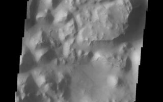 <h1>PIA10882:  Iani Chaos</h1><div class="PIA10882" lang="en" style="width:554px;text-align:left;margin:auto;background-color:#000;padding:10px;max-height:150px;overflow:auto;"><p><a href="/figures/PIA10882_fig1.jpg"></a><br><b>Context image for PIA10882<br />Iani Chaos</b></p><p>This VIS image shows a small portion of Iani Chaos. A landslide is present in the upper right side of the image.<p>Image information: VIS instrument. Latitude -0.8N, Longitude 343.7E. 18 meter/pixel resolution.</p><p>Please see the <a href="http://themis.asu.edu/terms" target="_blank">THEMIS Data Citation Note</a> for details on crediting THEMIS images.</p><p>Note: this THEMIS visual image has not been radiometrically nor geometrically calibrated for this preliminary release. An empirical correction has been performed to remove instrumental effects. A linear shift has been applied in the cross-track and down-track direction to approximate spacecraft and planetary motion. Fully calibrated and geometrically projected images will be released through the Planetary Data System in accordance with Project policies at a later time.</p><p>NASA's Jet Propulsion Laboratory manages the 2001 Mars Odyssey mission for NASA's Office of Space Science, Washington, D.C. The Thermal Emission Imaging System (THEMIS) was developed by Arizona State University, Tempe, in collaboration with Raytheon Santa Barbara Remote Sensing. The THEMIS investigation is led by Dr. Philip Christensen at Arizona State University. Lockheed Martin Astronautics, Denver, is the prime contractor for the Odyssey project, and developed and built the orbiter. Mission operations are conducted jointly from Lockheed Martin and from JPL, a division of the California Institute of Technology in Pasadena.<br /><br /><a href="http://photojournal.jpl.nasa.gov/catalog/PIA10882" onclick="window.open(this.href); return false;" title="Voir l'image 	 PIA10882:  Iani Chaos	  sur le site de la NASA">Voir l'image 	 PIA10882:  Iani Chaos	  sur le site de la NASA.</a></div>