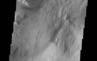 <h1>PIA10892:  Candor Chasma</h1><div class="PIA10892" lang="en" style="width:547px;text-align:left;margin:auto;background-color:#000;padding:10px;max-height:150px;overflow:auto;"><p><a href="/figures/PIA10892_fig1.jpg"></a><br><b>Context image for PIA10892<br />Candor Chasma</b></p><p>This VIS image shows some of the floor deposits within Candor Chasma. These deposits have been eroded by wind, and possibly by water.<p>Image information: VIS instrument. Latitude -8.0N, Longitude 295.2E. 18 meter/pixel resolution.</p><p>Please see the <a href="http://themis.asu.edu/terms" target="_blank">THEMIS Data Citation Note</a> for details on crediting THEMIS images.</p><p>Note: this THEMIS visual image has not been radiometrically nor geometrically calibrated for this preliminary release. An empirical correction has been performed to remove instrumental effects. A linear shift has been applied in the cross-track and down-track direction to approximate spacecraft and planetary motion. Fully calibrated and geometrically projected images will be released through the Planetary Data System in accordance with Project policies at a later time.</p><p>NASA's Jet Propulsion Laboratory manages the 2001 Mars Odyssey mission for NASA's Office of Space Science, Washington, D.C. The Thermal Emission Imaging System (THEMIS) was developed by Arizona State University, Tempe, in collaboration with Raytheon Santa Barbara Remote Sensing. The THEMIS investigation is led by Dr. Philip Christensen at Arizona State University. Lockheed Martin Astronautics, Denver, is the prime contractor for the Odyssey project, and developed and built the orbiter. Mission operations are conducted jointly from Lockheed Martin and from JPL, a division of the California Institute of Technology in Pasadena.<br /><br /><a href="http://photojournal.jpl.nasa.gov/catalog/PIA10892" onclick="window.open(this.href); return false;" title="Voir l'image 	 PIA10892:  Candor Chasma	  sur le site de la NASA">Voir l'image 	 PIA10892:  Candor Chasma	  sur le site de la NASA.</a></div>