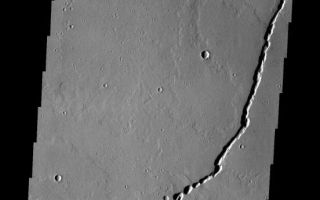 <h1>PIA10896:  Collapse Features</h1><div class="PIA10896" lang="en" style="width:552px;text-align:left;margin:auto;background-color:#000;padding:10px;max-height:150px;overflow:auto;"><p><a href="/figures/PIA10896_fig1.jpg"></a><br><b>Context image for PIA10896<br />Collapse Features</b></p><p>The connected oval depressions are locations where the surface has collapsed into voids in the underlying lava flow. This image is located in the Tharsis region north of Ascraeus Mons.<p>Image information: VIS instrument. Latitude 20.1N, Longitude 253.9E. 18 meter/pixel resolution.</p><p>Please see the <a href="http://themis.asu.edu/terms" target="_blank">THEMIS Data Citation Note</a> for details on crediting THEMIS images.</p><p>Note: this THEMIS visual image has not been radiometrically nor geometrically calibrated for this preliminary release. An empirical correction has been performed to remove instrumental effects. A linear shift has been applied in the cross-track and down-track direction to approximate spacecraft and planetary motion. Fully calibrated and geometrically projected images will be released through the Planetary Data System in accordance with Project policies at a later time.</p><p>NASA's Jet Propulsion Laboratory manages the 2001 Mars Odyssey mission for NASA's Office of Space Science, Washington, D.C. The Thermal Emission Imaging System (THEMIS) was developed by Arizona State University, Tempe, in collaboration with Raytheon Santa Barbara Remote Sensing. The THEMIS investigation is led by Dr. Philip Christensen at Arizona State University. Lockheed Martin Astronautics, Denver, is the prime contractor for the Odyssey project, and developed and built the orbiter. Mission operations are conducted jointly from Lockheed Martin and from JPL, a division of the California Institute of Technology in Pasadena.<br /><br /><a href="http://photojournal.jpl.nasa.gov/catalog/PIA10896" onclick="window.open(this.href); return false;" title="Voir l'image 	 PIA10896:  Collapse Features	  sur le site de la NASA">Voir l'image 	 PIA10896:  Collapse Features	  sur le site de la NASA.</a></div>