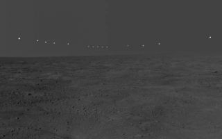 <h1>PIA10976:  Midnight Sun on Mars</h1><div class="PIA10976" lang="en" style="width:800px;text-align:left;margin:auto;background-color:#000;padding:10px;max-height:150px;overflow:auto;"><p>This panorama mosaic of images was taken by the Surface Stereo Imager on board NASA's Phoenix Mars Lander. This mosaic documents the midnight sun during several days of the mission.</p><p>The foreground and sky images were taken on Sol 54, or the 54th Martian day of the mission (July 20, 2008). The solar images were taken between 10 p.m. and 2 a.m., local solar time, during the nights of sols 46 to 56. During this period of 11 sols, the sun's path got slightly lower over the northern horizon, causing the lack of smoothness to the curve. This pan captures the polar nature of the Phoenix mission in its similarity to time lapse pictures taken above the Arctic Circle on Earth.</p><p>The Phoenix Mission is led by the University of Arizona, Tucson, on behalf of NASA. Project management of the mission is by NASA's Jet Propulsion Laboratory, Pasadena, Calif. Spacecraft development is by Lockheed Martin Space Systems, Denver.<br /><br /><a href="http://photojournal.jpl.nasa.gov/catalog/PIA10976" onclick="window.open(this.href); return false;" title="Voir l'image 	 PIA10976:  Midnight Sun on Mars	  sur le site de la NASA">Voir l'image 	 PIA10976:  Midnight Sun on Mars	  sur le site de la NASA.</a></div>