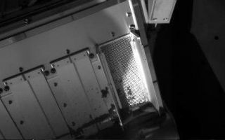<h1>PIA10999:  After Sample-Delivery Attempt, Sol 62</h1><div class="PIA10999" lang="en" style="width:512px;text-align:left;margin:auto;background-color:#000;padding:10px;max-height:150px;overflow:auto;"><p>NASA's Phoenix Mars Lander collected a soil sample and attempted to deliver some of it to a laboratory oven on the deck during the mission's 62nd Martian day, or sol, (July 28, 2008). The sample came from a hard layer at the bottom of the "Snow White" trench and might have contained water ice mixed with the soil. This image taken after the attempt to deliver the sample through the open doors to cell number zero on the Thermal and Evolved-Gas Analyzer shows that very little of the soil fell onto the screened opening.</p><p>Not enough material reached the oven, through a funnel under the screen, to proceed with analysis of the sample material.</p><p>Phoenix's Robotic Arm Camera took this image at 7:54 a.m. local solar time on Sol 62. The size of the screened opening is about 10 centimeters (4 inches) long by 4 centimeters (1.5 inches) wide.</p><p>The Phoenix Mission is led by the University of Arizona, Tucson, on behalf of NASA. Project management of the mission is by NASA's Jet Propulsion Laboratory, Pasadena, Calif. Spacecraft development is by Lockheed Martin Space Systems, Denver.<br /><br /><a href="http://photojournal.jpl.nasa.gov/catalog/PIA10999" onclick="window.open(this.href); return false;" title="Voir l'image 	 PIA10999:  After Sample-Delivery Attempt, Sol 62	  sur le site de la NASA">Voir l'image 	 PIA10999:  After Sample-Delivery Attempt, Sol 62	  sur le site de la NASA.</a></div>