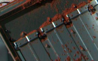 <h1>PIA11023:  Color View of 'Rosy Red' Delivered to TEGA</h1><div class="PIA11023" lang="en" style="width:512px;text-align:left;margin:auto;background-color:#000;padding:10px;max-height:150px;overflow:auto;"><p>NASA's Phoenix Mars Lander's Surface Stereo Imager took this false color image on Sol 72 (August 7, 2008), the 72nd Martian day after landing. It shows a soil sample from a trench informally called "Rosy Red" after being delivered to a gap between partially opened doors on the lander's Thermal and Evolved-Gas Analyzer, or TEGA. </p><p>The Phoenix Mission is led by the University of Arizona, Tucson, on behalf of NASA. Project management of the mission is by NASA's Jet Propulsion Laboratory, Pasadena, Calif. Spacecraft development is by Lockheed Martin Space Systems, Denver.<br /><br /><a href="http://photojournal.jpl.nasa.gov/catalog/PIA11023" onclick="window.open(this.href); return false;" title="Voir l'image 	 PIA11023:  Color View of 'Rosy Red' Delivered to TEGA	  sur le site de la NASA">Voir l'image 	 PIA11023:  Color View of 'Rosy Red' Delivered to TEGA	  sur le site de la NASA.</a></div>