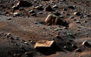 <h1>PIA11043:  Morning Frost on Martian Surface</h1><div class="PIA11043" lang="en" style="width:800px;text-align:left;margin:auto;background-color:#000;padding:10px;max-height:150px;overflow:auto;"><p>A thin layer of water frost is visible on the ground around NASA's Phoenix Mars Lander in this image taken by the Surface Stereo Imager at 6 a.m. on Sol 79 (August 14, 2008), the 79th Martian day after landing. The frost begins to disappear shortly after 6 a.m. as the sun rises on the Phoenix landing site.</p><p>The sun was about 22 degrees above the horizon when the image was taken, enhancing the detail of the polygons, troughs and rocks around the landing site.</p><p>This view is looking east southeast with the lander's eastern solar panel visible in the bottom lefthand corner of the image. The rock in the foreground is informally named "Quadlings" and the rock near center is informally called "Winkies."</p><p>This false color image has been enhanced to show color variations.</p><p>The Phoenix Mission is led by the University of Arizona, Tucson, on behalf of NASA. Project management of the mission is by NASA's Jet Propulsion Laboratory, Pasadena, Calif. Spacecraft development is by Lockheed Martin Space Systems, Denver.<br /><br /><a href="http://photojournal.jpl.nasa.gov/catalog/PIA11043" onclick="window.open(this.href); return false;" title="Voir l'image 	 PIA11043:  Morning Frost on Martian Surface	  sur le site de la NASA">Voir l'image 	 PIA11043:  Morning Frost on Martian Surface	  sur le site de la NASA.</a></div>