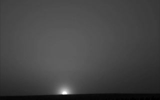 <h1>PIA11054:  Ice Cold Sunrise on Mars</h1><div class="PIA11054" lang="en" style="width:800px;text-align:left;margin:auto;background-color:#000;padding:10px;max-height:150px;overflow:auto;"><p>From the location of NASA's Phoenix Mars Lander, above the Martian arctic circle, the sun does not set during the peak of the Martian summer.</p><p>This period of maximum solar energy is past—on Sol 86, the 86th Martian day after the Phoenix landing, the sun fully set behind a slight rise to the north for about half an hour.</p><p>This red-filter image taken by the lander's Surface Stereo Imager, shows the sun rising on the morning of sol 90, Aug. 25, 2008, the last day of the Phoenix nominal mission.</p><p>The image was taken at 51 minutes past midnight local solar time during the slow sunrise that followed a 75 minute "night." The skylight in the image is light scattered off atmospheric dust particles and ice crystals.</p><p>The setting sun does not mean the end of the mission. In late July, the Phoenix Mission was extended through September, rather than the 90-sol duration originally planned as the prime mission.</p><p>The Phoenix Mission is led by the University of Arizona, Tucson, on behalf of NASA. Project management of the mission is by NASA's Jet Propulsion Laboratory, Pasadena, Calif. Spacecraft development is by Lockheed Martin Space Systems, Denver.<br /><br /><a href="http://photojournal.jpl.nasa.gov/catalog/PIA11054" onclick="window.open(this.href); return false;" title="Voir l'image 	 PIA11054:  Ice Cold Sunrise on Mars	  sur le site de la NASA">Voir l'image 	 PIA11054:  Ice Cold Sunrise on Mars	  sur le site de la NASA.</a></div>