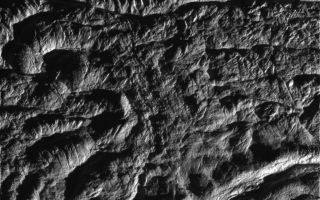 <h1>PIA11109:  Enceladus Rev 80 Flyby Skeet Shoot #4</h1><div class="PIA11109" lang="en" style="width:800px;text-align:left;margin:auto;background-color:#000;padding:10px;max-height:150px;overflow:auto;"><p>This image is the fourth skeet-shoot footprint taken during Cassini's very close flyby of Enceladus on Aug. 11, 2008. Cairo Sulcus is shown crossing the upper left portion of the image. An unnamed fracture curves around the lower right corner. (The image is upside down from the skeet-shoot footprint shown here.) The image was taken with the Cassini spacecraft narrow-angle camera on Aug. 11, 2008, a distance of approximately 3,027 kilometers (1,881 miles) above the surface of Enceladus. Image scale is approximately 20 meters (66 feet) per pixel.</p><p>The Cassini-Huygens mission is a cooperative project of NASA, the European Space Agency and the Italian Space Agency. The Jet Propulsion Laboratory, a division of the California Institute of Technology in Pasadena, manages the mission for NASA's Science Mission Directorate, Washington, D.C. The Cassini orbiter and its two onboard cameras were designed, developed and assembled at JPL. The imaging operations center is based at the Space Science Institute in Boulder, Colo.</p><p>For more information about the Cassini-Huygens mission visit <a href="http://saturn.jpl.nasa.gov" class="external free" target="wpext">http://saturn.jpl.nasa.gov/</a>. The Cassini imaging team homepage is at <a href="http://ciclops.org" class="external free" target="wpext">http://ciclops.org</a>.<br /><br /><a href="http://photojournal.jpl.nasa.gov/catalog/PIA11109" onclick="window.open(this.href); return false;" title="Voir l'image 	 PIA11109:  Enceladus Rev 80 Flyby Skeet Shoot #4	  sur le site de la NASA">Voir l'image 	 PIA11109:  Enceladus Rev 80 Flyby Skeet Shoot #4	  sur le site de la NASA.</a></div>