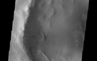<h1>PIA11232:  Gullies</h1><div class="PIA11232" lang="en" style="width:582px;text-align:left;margin:auto;background-color:#000;padding:10px;max-height:150px;overflow:auto;"><p><a href="/figures/PIA11232_fig1.jpg"></a><br><b>Context image for PIA11232<br />Gullies</b></p><p>This unnamed crater in western Utopia Planitia contains both gullies and a landslide deposit that may be related to the formation of some gullies.<p>Image information: VIS instrument. Latitude 53.1N, Longitude 57.6E. 19 meter/pixel resolution.</p><p>Please see the <a href="http://themis.asu.edu/terms" target="_blank">THEMIS Data Citation Note</a> for details on crediting THEMIS images.</p><p>Note: this THEMIS visual image has not been radiometrically nor geometrically calibrated for this preliminary release. An empirical correction has been performed to remove instrumental effects. A linear shift has been applied in the cross-track and down-track direction to approximate spacecraft and planetary motion. Fully calibrated and geometrically projected images will be released through the Planetary Data System in accordance with Project policies at a later time.</p><p>NASA's Jet Propulsion Laboratory manages the 2001 Mars Odyssey mission for NASA's Office of Space Science, Washington, D.C. The Thermal Emission Imaging System (THEMIS) was developed by Arizona State University, Tempe, in collaboration with Raytheon Santa Barbara Remote Sensing. The THEMIS investigation is led by Dr. Philip Christensen at Arizona State University. Lockheed Martin Astronautics, Denver, is the prime contractor for the Odyssey project, and developed and built the orbiter. Mission operations are conducted jointly from Lockheed Martin and from JPL, a division of the California Institute of Technology in Pasadena.<br /><br /><a href="http://photojournal.jpl.nasa.gov/catalog/PIA11232" onclick="window.open(this.href); return false;" title="Voir l'image 	 PIA11232:  Gullies	  sur le site de la NASA">Voir l'image 	 PIA11232:  Gullies	  sur le site de la NASA.</a></div>