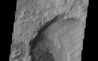 <h1>PIA11263:  Dunes and Channel</h1><div class="PIA11263" lang="en" style="width:552px;text-align:left;margin:auto;background-color:#000;padding:10px;max-height:150px;overflow:auto;"><p><a href="/figures/PIA11263_fig1.jpg"></a><br><b>Context image for PIA11263<br />Dunes and Channel</b></p><p>This VIS image shows part of Tagus Valles and a small field of dunes in an unnamed crater.</p><p>Image information: VIS instrument. Latitude -6.0N, Longitude 114.9E. 18 meter/pixel resolution.</p><p>Please see the <a href="http://themis.asu.edu/terms" target="_blank">THEMIS Data Citation Note</a> for details on crediting THEMIS images.</p><p>Note: this THEMIS visual image has not been radiometrically nor geometrically calibrated for this preliminary release. An empirical correction has been performed to remove instrumental effects. A linear shift has been applied in the cross-track and down-track direction to approximate spacecraft and planetary motion. Fully calibrated and geometrically projected images will be released through the Planetary Data System in accordance with Project policies at a later time.</p><p>NASA's Jet Propulsion Laboratory manages the 2001 Mars Odyssey mission for NASA's Office of Space Science, Washington, D.C. The Thermal Emission Imaging System (THEMIS) was developed by Arizona State University, Tempe, in collaboration with Raytheon Santa Barbara Remote Sensing. The THEMIS investigation is led by Dr. Philip Christensen at Arizona State University. Lockheed Martin Astronautics, Denver, is the prime contractor for the Odyssey project, and developed and built the orbiter. Mission operations are conducted jointly from Lockheed Martin and from JPL, a division of the California Institute of Technology in Pasadena.<br /><br /><a href="http://photojournal.jpl.nasa.gov/catalog/PIA11263" onclick="window.open(this.href); return false;" title="Voir l'image 	 PIA11263:  Dunes and Channel	  sur le site de la NASA">Voir l'image 	 PIA11263:  Dunes and Channel	  sur le site de la NASA.</a></div>