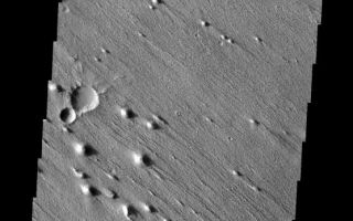 <h1>PIA11268:  Wind Erosion</h1><div class="PIA11268" lang="en" style="width:556px;text-align:left;margin:auto;background-color:#000;padding:10px;max-height:150px;overflow:auto;"><p><a href="/figures/PIA11268_fig1.png"></a><br><b>Context image for PIA11268<br />Wind Erosion</b></p><p>This VIS image shows erosion by winds in one direction. This image is located within Aeolis Planum.<p>Image information: VIS instrument. Latitude 2.4N, Longitude 143.6E. 18 meter/pixel resolution.</p><p>Please see the <a href="http://themis.asu.edu/terms" target="_blank">THEMIS Data Citation Note</a> for details on crediting THEMIS images.</p><p>Note: this THEMIS visual image has not been radiometrically nor geometrically calibrated for this preliminary release. An empirical correction has been performed to remove instrumental effects. A linear shift has been applied in the cross-track and down-track direction to approximate spacecraft and planetary motion. Fully calibrated and geometrically projected images will be released through the Planetary Data System in accordance with Project policies at a later time.</p><p>NASA's Jet Propulsion Laboratory manages the 2001 Mars Odyssey mission for NASA's Office of Space Science, Washington, D.C. The Thermal Emission Imaging System (THEMIS) was developed by Arizona State University, Tempe, in collaboration with Raytheon Santa Barbara Remote Sensing. The THEMIS investigation is led by Dr. Philip Christensen at Arizona State University. Lockheed Martin Astronautics, Denver, is the prime contractor for the Odyssey project, and developed and built the orbiter. Mission operations are conducted jointly from Lockheed Martin and from JPL, a division of the California Institute of Technology in Pasadena.<br /><br /><a href="http://photojournal.jpl.nasa.gov/catalog/PIA11268" onclick="window.open(this.href); return false;" title="Voir l'image 	 PIA11268:  Wind Erosion	  sur le site de la NASA">Voir l'image 	 PIA11268:  Wind Erosion	  sur le site de la NASA.</a></div>