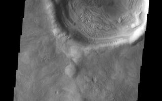 <h1>PIA11271:  Dunes</h1><div class="PIA11271" lang="en" style="width:565px;text-align:left;margin:auto;background-color:#000;padding:10px;max-height:150px;overflow:auto;"><p><a href="/figures/PIA11271_fig1.png"></a><br><b>Context image for PIA11271<br />Dunes</b></p><p>A small dune field is located on the floor of this unnamed crater on the eastern margin of Terra Sabaea.<p>Image information: VIS instrument. Latitude 36.8N, Longitude 59.7E. 19 meter/pixel resolution.</p><p>Please see the <a href="http://themis.asu.edu/terms" target="_blank">THEMIS Data Citation Note</a> for details on crediting THEMIS images.</p><p>Note: this THEMIS visual image has not been radiometrically nor geometrically calibrated for this preliminary release. An empirical correction has been performed to remove instrumental effects. A linear shift has been applied in the cross-track and down-track direction to approximate spacecraft and planetary motion. Fully calibrated and geometrically projected images will be released through the Planetary Data System in accordance with Project policies at a later time.</p><p>NASA's Jet Propulsion Laboratory manages the 2001 Mars Odyssey mission for NASA's Office of Space Science, Washington, D.C. The Thermal Emission Imaging System (THEMIS) was developed by Arizona State University, Tempe, in collaboration with Raytheon Santa Barbara Remote Sensing. The THEMIS investigation is led by Dr. Philip Christensen at Arizona State University. Lockheed Martin Astronautics, Denver, is the prime contractor for the Odyssey project, and developed and built the orbiter. Mission operations are conducted jointly from Lockheed Martin and from JPL, a division of the California Institute of Technology in Pasadena.<br /><br /><a href="http://photojournal.jpl.nasa.gov/catalog/PIA11271" onclick="window.open(this.href); return false;" title="Voir l'image 	 PIA11271:  Dunes	  sur le site de la NASA">Voir l'image 	 PIA11271:  Dunes	  sur le site de la NASA.</a></div>
