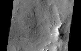 <h1>PIA11276:  Dark Slope Streaks</h1><div class="PIA11276" lang="en" style="width:559px;text-align:left;margin:auto;background-color:#000;padding:10px;max-height:150px;overflow:auto;"><p><a href="/figures/PIA11276_fig1.png"></a><br><b>Context image for PIA11276<br />Dark Slope Streaks</b></p><p>These dark slope streaks are located on an ancient crater rim near Henry Crater.<p>Image information: VIS instrument. Latitude 13.6N, Longitude 21.2E. 18 meter/pixel resolution.</p><p>Please see the <a href="http://themis.asu.edu/terms" target="_blank">THEMIS Data Citation Note</a> for details on crediting THEMIS images.</p><p>Note: this THEMIS visual image has not been radiometrically nor geometrically calibrated for this preliminary release. An empirical correction has been performed to remove instrumental effects. A linear shift has been applied in the cross-track and down-track direction to approximate spacecraft and planetary motion. Fully calibrated and geometrically projected images will be released through the Planetary Data System in accordance with Project policies at a later time.</p><p>NASA's Jet Propulsion Laboratory manages the 2001 Mars Odyssey mission for NASA's Office of Space Science, Washington, D.C. The Thermal Emission Imaging System (THEMIS) was developed by Arizona State University, Tempe, in collaboration with Raytheon Santa Barbara Remote Sensing. The THEMIS investigation is led by Dr. Philip Christensen at Arizona State University. Lockheed Martin Astronautics, Denver, is the prime contractor for the Odyssey project, and developed and built the orbiter. Mission operations are conducted jointly from Lockheed Martin and from JPL, a division of the California Institute of Technology in Pasadena.<br /><br /><a href="http://photojournal.jpl.nasa.gov/catalog/PIA11276" onclick="window.open(this.href); return false;" title="Voir l'image 	 PIA11276:  Dark Slope Streaks	  sur le site de la NASA">Voir l'image 	 PIA11276:  Dark Slope Streaks	  sur le site de la NASA.</a></div>