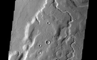 <h1>PIA11282:  Tempe Terra</h1><div class="PIA11282" lang="en" style="width:578px;text-align:left;margin:auto;background-color:#000;padding:10px;max-height:150px;overflow:auto;"><p><a href="/figures/PIA11282_fig1.png"></a><br><b>Context image for PIA11282<br />Tempe Terra</b></p><p>The unnamed channel in this VIS image is located on the eastern margin of Tempe Terra.<p>Image information: VIS instrument. Latitude 43.6N, Longitude 305.2E. 19 meter/pixel resolution.</p><p>Please see the <a href="http://themis.asu.edu/terms" target="_blank">THEMIS Data Citation Note</a> for details on crediting THEMIS images.</p><p>Note: this THEMIS visual image has not been radiometrically nor geometrically calibrated for this preliminary release. An empirical correction has been performed to remove instrumental effects. A linear shift has been applied in the cross-track and down-track direction to approximate spacecraft and planetary motion. Fully calibrated and geometrically projected images will be released through the Planetary Data System in accordance with Project policies at a later time.</p><p>NASA's Jet Propulsion Laboratory manages the 2001 Mars Odyssey mission for NASA's Office of Space Science, Washington, D.C. The Thermal Emission Imaging System (THEMIS) was developed by Arizona State University, Tempe, in collaboration with Raytheon Santa Barbara Remote Sensing. The THEMIS investigation is led by Dr. Philip Christensen at Arizona State University. Lockheed Martin Astronautics, Denver, is the prime contractor for the Odyssey project, and developed and built the orbiter. Mission operations are conducted jointly from Lockheed Martin and from JPL, a division of the California Institute of Technology in Pasadena.<br /><br /><a href="http://photojournal.jpl.nasa.gov/catalog/PIA11282" onclick="window.open(this.href); return false;" title="Voir l'image 	 PIA11282:  Tempe Terra	  sur le site de la NASA">Voir l'image 	 PIA11282:  Tempe Terra	  sur le site de la NASA.</a></div>