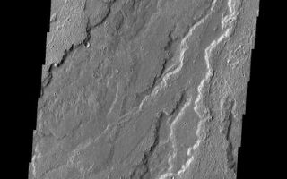 <h1>PIA11283:  Daedalia Planum</h1><div class="PIA11283" lang="en" style="width:541px;text-align:left;margin:auto;background-color:#000;padding:10px;max-height:150px;overflow:auto;"><p><a href="/figures/PIA11283_fig1.png"></a><br><b>Context image for PIA11283<br />Daedalia Planum</b></p><p>This image shows a small portion of the extensive lava flows from Arsia Mons that make up Daedalia Planum.<p>Image information: VIS instrument. Latitude -21.1N, Longitude 240.8E. 17 meter/pixel resolution.</p><p>Please see the <a href="http://themis.asu.edu/terms" target="_blank">THEMIS Data Citation Note</a> for details on crediting THEMIS images.</p><p>Note: this THEMIS visual image has not been radiometrically nor geometrically calibrated for this preliminary release. An empirical correction has been performed to remove instrumental effects. A linear shift has been applied in the cross-track and down-track direction to approximate spacecraft and planetary motion. Fully calibrated and geometrically projected images will be released through the Planetary Data System in accordance with Project policies at a later time.</p><p>NASA's Jet Propulsion Laboratory manages the 2001 Mars Odyssey mission for NASA's Office of Space Science, Washington, D.C. The Thermal Emission Imaging System (THEMIS) was developed by Arizona State University, Tempe, in collaboration with Raytheon Santa Barbara Remote Sensing. The THEMIS investigation is led by Dr. Philip Christensen at Arizona State University. Lockheed Martin Astronautics, Denver, is the prime contractor for the Odyssey project, and developed and built the orbiter. Mission operations are conducted jointly from Lockheed Martin and from JPL, a division of the California Institute of Technology in Pasadena.<br /><br /><a href="http://photojournal.jpl.nasa.gov/catalog/PIA11283" onclick="window.open(this.href); return false;" title="Voir l'image 	 PIA11283:  Daedalia Planum	  sur le site de la NASA">Voir l'image 	 PIA11283:  Daedalia Planum	  sur le site de la NASA.</a></div>