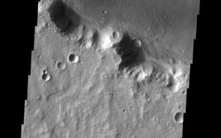 <h1>PIA11285:  Dunes</h1><div class="PIA11285" lang="en" style="width:551px;text-align:left;margin:auto;background-color:#000;padding:10px;max-height:150px;overflow:auto;"><p><a href="/figures/PIA11285_fig1.png"></a><br><b>Context image for PIA11285<br />Dunes</b></p><p>These small dark dunes are located on the floor of an unnamed crater in Tyrrhena Terra.<p>Image information: VIS instrument. Latitude -9.9N, Longitude 98.1E. 18 meter/pixel resolution.</p><p>Please see the <a href="http://themis.asu.edu/terms" target="_blank">THEMIS Data Citation Note</a> for details on crediting THEMIS images.</p><p>Note: this THEMIS visual image has not been radiometrically nor geometrically calibrated for this preliminary release. An empirical correction has been performed to remove instrumental effects. A linear shift has been applied in the cross-track and down-track direction to approximate spacecraft and planetary motion. Fully calibrated and geometrically projected images will be released through the Planetary Data System in accordance with Project policies at a later time.</p><p>NASA's Jet Propulsion Laboratory manages the 2001 Mars Odyssey mission for NASA's Office of Space Science, Washington, D.C. The Thermal Emission Imaging System (THEMIS) was developed by Arizona State University, Tempe, in collaboration with Raytheon Santa Barbara Remote Sensing. The THEMIS investigation is led by Dr. Philip Christensen at Arizona State University. Lockheed Martin Astronautics, Denver, is the prime contractor for the Odyssey project, and developed and built the orbiter. Mission operations are conducted jointly from Lockheed Martin and from JPL, a division of the California Institute of Technology in Pasadena.<br /><br /><a href="http://photojournal.jpl.nasa.gov/catalog/PIA11285" onclick="window.open(this.href); return false;" title="Voir l'image 	 PIA11285:  Dunes	  sur le site de la NASA">Voir l'image 	 PIA11285:  Dunes	  sur le site de la NASA.</a></div>