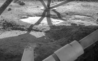 <h1>PIA11379:  Underneath the Phoenix Lander</h1><div class="PIA11379" lang="en" style="width:512px;text-align:left;margin:auto;background-color:#000;padding:10px;max-height:150px;overflow:auto;"><p>The Robotic Arm Camera on NASA's Phoenix Mars Lander took this image on Oct. 18, 2008, during the 142nd Martian day, or sol, since landing. The flat patch in the center of the image has the informal name "Holy Cow," based on researchers' reaction when they saw the initial image of it only a few days after the May 25, 2008 landing. Researchers first saw this flat patch in an image taken by the Robotic Arm Camera on May 30, the fifth Martian day of the mission. </p><p>The Phoenix mission is led by the University of Arizona, Tucson, on behalf of NASA. Project management of the mission is by NASA's Jet Propulsion Laboratory, Pasadena, Calif. Spacecraft development is by Lockheed Martin Space Systems, Denver.<br /><br /><a href="http://photojournal.jpl.nasa.gov/catalog/PIA11379" onclick="window.open(this.href); return false;" title="Voir l'image 	 PIA11379:  Underneath the Phoenix Lander	  sur le site de la NASA">Voir l'image 	 PIA11379:  Underneath the Phoenix Lander	  sur le site de la NASA.</a></div>