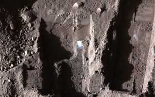 <h1>PIA11383:  Phoenix Deepens Trenches on Mars</h1><div class="PIA11383" lang="en" style="width:800px;text-align:left;margin:auto;background-color:#000;padding:10px;max-height:150px;overflow:auto;"><p>The Surface Stereo Imager on NASA's Phoenix Mars Lander took this false color image on Oct. 21, 2008, during the 145th Martian day, or sol, since landing. The bluish-white areas seen in these trenches are part of an ice layer beneath the soil.</p><p>The trench on the upper left, called "Dodo-Goldilocks," is about 38 centimeters (15 inches) long and 4 centimeters (1.5 inches) deep. The trench on the right, called "Upper Cupboard," is about 60 centimeters (24 inches) long and 3 centimeters (1 inch) deep. The trench in the lower middle is called "Stone Soup."</p><p>The Phoenix mission is led by the University of Arizona, Tucson, on behalf of NASA. Project management of the mission is by NASA's Jet Propulsion Laboratory, Pasadena, Calif. Spacecraft development is by Lockheed Martin Space Systems, Denver.<br /><br /><a href="http://photojournal.jpl.nasa.gov/catalog/PIA11383" onclick="window.open(this.href); return false;" title="Voir l'image 	 PIA11383:  Phoenix Deepens Trenches on Mars	  sur le site de la NASA">Voir l'image 	 PIA11383:  Phoenix Deepens Trenches on Mars	  sur le site de la NASA.</a></div>