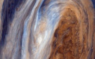 <h1>PIA00018:  Exaggerated Color View of the Great Red Spot</h1><div class="PIA00018" lang="en" style="width:800px;text-align:left;margin:auto;background-color:#000;padding:10px;max-height:150px;overflow:auto;">This view of the Great Red Spot is seen in greatly exaggerated color. The colors do not represent the true hues seen in the Jovian atmosphere but have been produced by special computer processing to enhance subtle variations in both color and shading. JPL manages and controls the Voyager Project for NASA's Office of Space Science.<br /><br /><a href="http://photojournal.jpl.nasa.gov/catalog/PIA00018" onclick="window.open(this.href); return false;" title="Voir l'image 	 PIA00018:  Exaggerated Color View of the Great Red Spot	  sur le site de la NASA">Voir l'image 	 PIA00018:  Exaggerated Color View of the Great Red Spot	  sur le site de la NASA.</a></div>