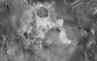 <h1>PIA00480:  Venus - Impact Crater 'Isabella</h1><div class="PIA00480" lang="en" style="width:800px;text-align:left;margin:auto;background-color:#000;padding:10px;max-height:150px;overflow:auto;">Crater Isabella, with a diameter of 175 kilometers (108 miles), seen in this Magellan radar image, is the second largest impact crater on Venus. The feature is named in honor of the 15th Century queen of Spain, Isabella of Castile. Located at 30 degrees south latitude, 204 degrees east longitude, the crater has two extensive flow-like structures extending to the south and to the southeast. The end of the southern flow partially surrounds a pre-existing 40 kilometer (25 mile) circular volcanic shield. The southeastern flow shows a complex pattern of channels and flow lobes, and is overlain at its southeastern tip by deposits from a later 20 kilometer (12 mile) diameter impact crater, Cohn (for Carola Cohn, Australian artist, 1892-1964). The extensive flows, unique to Venusian impact craters, are a continuing subject of study for a number of planetary scientists. It is thought that the flows may consist of 'impact melt,' rock melted by the intense heat released in the impact explosion. An alternate hypothesis invokes 'debris flows,' which may consist of clouds of hot gases and both melted and solid rock fragments that race across the landscape during the impact event. That type of emplacement process is similar to that which occurs in violent eruptions on Earth, such as the 1991 Mount Pinatubo eruption in the Philippines.<br /><br /><a href="http://photojournal.jpl.nasa.gov/catalog/PIA00480" onclick="window.open(this.href); return false;" title="Voir l'image 	 PIA00480:  Venus - Impact Crater 'Isabella	  sur le site de la NASA">Voir l'image 	 PIA00480:  Venus - Impact Crater 'Isabella	  sur le site de la NASA.</a></div>
