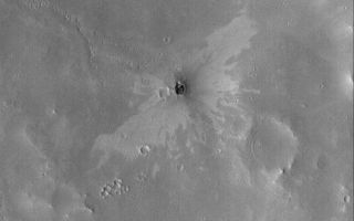 <h1>PIA03961:  Small Impact Crater</h1><div class="PIA03961" lang="en" style="width:672px;text-align:left;margin:auto;background-color:#000;padding:10px;max-height:150px;overflow:auto;"><p>22 June 2005<br />This Mars Global Surveyor (MGS) Mars Orbiter Camera (MOC) image shows a small impact crater with a "butterfly" ejecta pattern. The butterfly pattern results from an oblique impact. Not all oblique impacts result in an elliptical crater, but they can result in a non-radial pattern of ejecta distribution. The two-toned nature of the ejecta -- with dark material near the crater and brighter material further away -- might indicate the nature of subsurface materials. Below the surface, there may be a layer of lighter-toned material, underlain by a layer of darker material. The impact throws these materials out in a pattern that reflects the nature of the underlying layers.</p><p>Location near: 3.7°N, 348.2°W <br />Image width: ~3 km (~1.9 mi) <br />Illumination from: lower left <br />Season: Northern Autumn <br /></p><br /><br /><a href="http://photojournal.jpl.nasa.gov/catalog/PIA03961" onclick="window.open(this.href); return false;" title="Voir l'image 	 PIA03961:  Small Impact Crater	  sur le site de la NASA">Voir l'image 	 PIA03961:  Small Impact Crater	  sur le site de la NASA.</a></div>