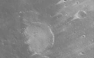 <h1>PIA04794:  Pavonis Wind Streaks</h1><div class="PIA04794" lang="en" style="width:672px;text-align:left;margin:auto;background-color:#000;padding:10px;max-height:150px;overflow:auto;">MGS MOC Release No. MOC2-512, 13 October 2003<p />This Mars Global Surveyor (MGS) Mars Orbiter Camera (MOC) picture shows wind tails and streaks formed in fine sediment that mantles the upper southwest slopes of the equatorial volcano, Pavonis Mons. On the large martian volcanoes, winds tend to blow downslope. The streaks shown here are evidence of the powerful ability for the thin atmosphere over the martian volcanoes to transport sediment. This picture is located near 0.1°N, 113.8°W, and covers an area 3 km (1.9 mi) wide. The image is illuminated by sunlight from the lower left.<br /><br /><a href="http://photojournal.jpl.nasa.gov/catalog/PIA04794" onclick="window.open(this.href); return false;" title="Voir l'image 	 PIA04794:  Pavonis Wind Streaks	  sur le site de la NASA">Voir l'image 	 PIA04794:  Pavonis Wind Streaks	  sur le site de la NASA.</a></div>