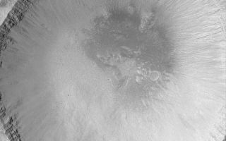 <h1>PIA04807:  Impact Crater</h1><div class="PIA04807" lang="en" style="width:800px;text-align:left;margin:auto;background-color:#000;padding:10px;max-height:150px;overflow:auto;">MGS MOC Release No. MOC2-520, 21 October 2003<p />Craters formed by meteor impact are the "tools of the trade" for planetary geologists. Craters have formed on every solid Solar System body, and thus they can be compared to each other and provide insights as to the nature of the object on which the crater occurs. Mars is pocked with craters of a wide range of diameters, from the giant Hellas Basin, which is several thousand kilometers across, to tiny craters of only a few tens of meters in diameter. The impact crater shown in this Mars Global Surveyor (MGS) Mars Orbiter Camera (MOC) picture is located in northern Elysium Planitia near 33.1°N, 230.2°W. It is about 3.6 km (2.2 mi) across, nearly four times the size of the famous Meteor Crater in northern Arizona on the North American continent. The impact that formed this crater exposed layered bedrock (visible in the upper walls of the crater). Erosion, mostly by dry mass movement, has created gullies and piles of talus on the crater walls. Dark dots at the base of the wall are large boulders that have come down these slopes. The picture covers an area 3 km (1.9 mi) wide. The scene is illuminated by sunlight from the left/lower left.<br /><br /><a href="http://photojournal.jpl.nasa.gov/catalog/PIA04807" onclick="window.open(this.href); return false;" title="Voir l'image 	 PIA04807:  Impact Crater	  sur le site de la NASA">Voir l'image 	 PIA04807:  Impact Crater	  sur le site de la NASA.</a></div>