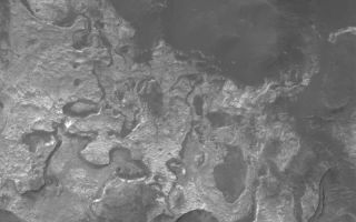 <h1>PIA05806:  Columbus Wall Outcrop</h1><div class="PIA05806" lang="en" style="width:800px;text-align:left;margin:auto;background-color:#000;padding:10px;max-height:150px;overflow:auto;"><p>25 April 2004<br />This Mars Global Surveyor (MGS) Mars Orbiter Camera (MOC) image shows light-toned, somewhat layered rock outcrops on the north wall of Columbus Crater, located near 28.7°S, 166.3°W. This material is a remnant of a formerly more extensive light-toned unit that extended across the floor of Columbus. Today, remnants are found all around the walls of the crater, and at least one small remnant has been spotted on the crater floor. The picture covers an area about 3 km (1.9 mi) across. Sunlight illuminates the scene from the upper left.</p><br /><br /><a href="http://photojournal.jpl.nasa.gov/catalog/PIA05806" onclick="window.open(this.href); return false;" title="Voir l'image 	 PIA05806:  Columbus Wall Outcrop	  sur le site de la NASA">Voir l'image 	 PIA05806:  Columbus Wall Outcrop	  sur le site de la NASA.</a></div>
