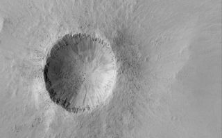<h1>PIA05846:  Small, Bouldery Crater</h1><div class="PIA05846" lang="en" style="width:800px;text-align:left;margin:auto;background-color:#000;padding:10px;max-height:150px;overflow:auto;"><p>30 April 2004<br />This Mars Global Surveyor (MGS) Mars Orbiter Camera (MOC) image shows a relatively young impact crater located in southeastern Arabia Terra near 4.8°N, 313.9°W. It is about 1 kilometer (about six tenths of a mile) in diameter, roughly the size of the famous Meteor Crater in northern Arizona, U.S.A. Indeed, the Arizona crater may once have looked very similar to this, but erosion on Earth has been more vigorous than on the modern Mars. Large boulders, many of them bigger than a typical house, can be seen in the ejecta blanket and on the crater floor. Fine, bright dust, common throughout Arabia Terra, has thinly mantled all but the steepest slopes. The image is illuminated by sunlight from the left/upper left. The picture covers an area about 3 km (1.9 mi) across.</p><br /><br /><a href="http://photojournal.jpl.nasa.gov/catalog/PIA05846" onclick="window.open(this.href); return false;" title="Voir l'image 	 PIA05846:  Small, Bouldery Crater	  sur le site de la NASA">Voir l'image 	 PIA05846:  Small, Bouldery Crater	  sur le site de la NASA.</a></div>