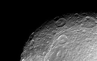 <h1>PIA06156:  Dione Close-up</h1><div class="PIA06156" lang="en" style="width:800px;text-align:left;margin:auto;background-color:#000;padding:10px;max-height:150px;overflow:auto;"><p>This incredible, high resolution view of Saturn's moon Dione was taken during Cassini's first close approach to the icy moon on Dec. 14, 2004. The view shows linear, curving features within the region of the bright wispy terrain Dione is known for.</p><p>The image was obtained in visible light with the Cassini spacecraft narrow angle camera at a distance of approximately 156,000 kilometers (97,000 miles) from Dione. The Sun-Dione-spacecraft, or phase, angle is 34 degrees. The image scale is about 1 kilometer (0.6 miles) per pixel.</p><p>The Cassini-Huygens mission is a cooperative project of NASA, the European Space Agency and the Italian Space Agency. The Jet Propulsion Laboratory, a division of the California Institute of Technology in Pasadena, manages the mission for NASA's Science Mission Directorate, Washington, D.C. The Cassini orbiter and its two onboard cameras were designed, developed and assembled at JPL. The imaging team is based at the Space Science Institute, Boulder, Colo.</p><p>For more information, about the Cassini-Huygens mission visit, <a href="http://saturn.jpl.nasa.gov/">http://saturn.jpl.nasa.gov</a> and the Cassini imaging team home page, <a href="http://ciclops.org/">http://ciclops.org</a>.</p><br /><br /><a href="http://photojournal.jpl.nasa.gov/catalog/PIA06156" onclick="window.open(this.href); return false;" title="Voir l'image 	 PIA06156:  Dione Close-up	  sur le site de la NASA">Voir l'image 	 PIA06156:  Dione Close-up	  sur le site de la NASA.</a></div>
