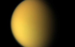 <h1>PIA06230:  Cassini's View of Titan: Natural Color Composite</h1><div class="PIA06230" lang="en" style="width:758px;text-align:left;margin:auto;background-color:#000;padding:10px;max-height:150px;overflow:auto;"><p>This natural color composite was taken during the Cassini spacecraft's April 16, 2005, flyby of Titan. It is a combination of images taken through three filters that are sensitive to red, green and violet light. </p><p>It shows approximately what Titan would look like to the human eye: a hazy orange globe surrounded by a tenuous, bluish haze. The orange color is due to the hydrocarbon particles which make up Titan's atmospheric haze. This obscuring haze was particularly frustrating for planetary scientists following the NASA Voyager mission encounters in 1980-81. Fortunately, Cassini is able to pierce Titan's veil at infrared wavelengths (see <a href="/catalog/PIA06228">PIA06228</a>).</p><p>North on Titan is up and tilted 30 degrees to the right.</p><p>The images to create this composite were taken with the Cassini spacecraft wide angle camera on April 16, 2005, at distances ranging from approximately 173,000 to 168,200 kilometers (107,500 to 104,500 miles) from Titan and from a Sun-Titan-spacecraft, or phase, angle of 56 degrees. Resolution in the images is approximately 10 kilometers per pixel.</p><p>The Cassini-Huygens mission is a cooperative project of NASA, the European Space Agency and the Italian Space Agency. The Jet Propulsion Laboratory, a division of the California Institute of Technology in Pasadena, manages the mission for NASA's Science Mission Directorate, Washington, D.C. The Cassini orbiter and its two onboard cameras were designed, developed and assembled at JPL. The imaging team is based at the Space Science Institute, Boulder, Colo.</p><p>For more information about the Cassini-Huygens mission, visit <a href="http://saturn.jpl.nasa.gov">http://saturn.jpl.nasa.gov</a> and the Cassini imaging team home page, <a href="http://ciclops.org">http://ciclops.org</a>.</p><br /><br /><a href="http://photojournal.jpl.nasa.gov/catalog/PIA06230" onclick="window.open(this.href); return false;" title="Voir l'image 	 PIA06230:  Cassini's View of Titan: Natural Color Composite	  sur le site de la NASA">Voir l'image 	 PIA06230:  Cassini's View of Titan: Natural Color Composite	  sur le site de la NASA.</a></div>