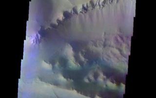 <h1>PIA06864:  Ius Chasma In False Color</h1><div class="PIA06864" lang="en" style="width:603px;text-align:left;margin:auto;background-color:#000;padding:10px;max-height:150px;overflow:auto;"><a href="/figures/PIA06864_fig1.jpg"> </a><br /><p>The Odyssey spacecraft has taken some great pictures of Valles Marineris, the largest canyon in the solar system. If this canyon were on Earth, it would stretch from New York to Los Angeles. For the next several weeks, the Image of the Day will tour some of the canyons that make up this vast system. We will start with Ius Chasma in the west, and end with Coprates Chasma to the east. For more information on Vallis Marineris, please see <a href="http://mars.jpl.nasa.gov/mep/science/vm.html">http://mars.jpl.nasa.gov/mep/science/vm.html</a>.</p><p>This daytime false-color image was collected during the southern spring season.</p>Image information: VIS instrument. Latitude -7.3, Longitude 281.3 East (78.7 West). 19 meter/pixel resolution.</p><p>Note: this THEMIS visual image has not been radiometrically nor geometrically calibrated for this preliminary release. An empirical correction has been performed to remove instrumental effects. A linear shift has been applied in the cross-track and down-track direction to approximate spacecraft and planetary motion. Fully calibrated and geometrically projected images will be released through the Planetary Data System in accordance with Project policies at a later time.</p><p>NASA's Jet Propulsion Laboratory manages the 2001 Mars Odyssey mission for NASA's Office of Space Science, Washington, D.C. The Thermal Emission Imaging System (THEMIS) was developed by Arizona State University, Tempe, in collaboration with Raytheon Santa Barbara Remote Sensing. The THEMIS investigation is led by Dr. Philip Christensen at Arizona State University. Lockheed Martin Astronautics, Denver, is the prime contractor for the Odyssey project, and developed and built the orbiter. Mission operations are conducted jointly from Lockheed Martin and from JPL, a division of the California Institute of Technology in Pasadena.</p><br /><br /><a href="http://photojournal.jpl.nasa.gov/catalog/PIA06864" onclick="window.open(this.href); return false;" title="Voir l'image 	 PIA06864:  Ius Chasma In False Color	  sur le site de la NASA">Voir l'image 	 PIA06864:  Ius Chasma In False Color	  sur le site de la NASA.</a></div>