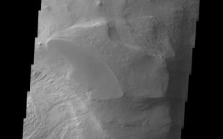 <h1>PIA06889:  Layered Rock in Candor Chasma</h1><div class="PIA06889" lang="en" style="width:536px;text-align:left;margin:auto;background-color:#000;padding:10px;max-height:150px;overflow:auto;"><a href="/figures/PIA06889_fig1.jpg"> </a><br /><p>The Odyssey spacecraft has taken some great pictures of Valles Marineris, the largest canyon in the solar system. If this canyon were on Earth, it would stretch from New York to Los Angeles. For the next several weeks, the Image of the Day will tour some of the canyons that make up this vast system. We will start with Ius Chasma in the west, and end with Coprates Chasma to the east. For more information on Vallis Marineris, please see <a href="http://mars.jpl.nasa.gov/mep/science/vm.html">http://mars.jpl.nasa.gov/mep/science/vm.html</a>.</p><p>This image shows a layered rock formation that is located in Candor Chasma.</p><p>Image information: VIS instrument. Latitude -6.9, Longitude 290.3 East (69.7. West). 19 meter/pixel resolution.</p><p>Note: this THEMIS visual image has not been radiometrically nor geometrically calibrated for this preliminary release. An empirical correction has been performed to remove instrumental effects. A linear shift has been applied in the cross-track and down-track direction to approximate spacecraft and planetary motion. Fully calibrated and geometrically projected images will be released through the Planetary Data System in accordance with Project policies at a later time.</p><p>NASA's Jet Propulsion Laboratory manages the 2001 Mars Odyssey mission for NASA's Office of Space Science, Washington, D.C. The Thermal Emission Imaging System (THEMIS) was developed by Arizona State University, Tempe, in collaboration with Raytheon Santa Barbara Remote Sensing. The THEMIS investigation is led by Dr. Philip Christensen at Arizona State University. Lockheed Martin Astronautics, Denver, is the prime contractor for the Odyssey project, and developed and built the orbiter. Mission operations are conducted jointly from Lockheed Martin and from JPL, a division of the California Institute of Technology in Pasadena.</p><br /><br /><a href="http://photojournal.jpl.nasa.gov/catalog/PIA06889" onclick="window.open(this.href); return false;" title="Voir l'image 	 PIA06889:  Layered Rock in Candor Chasma	  sur le site de la NASA">Voir l'image 	 PIA06889:  Layered Rock in Candor Chasma	  sur le site de la NASA.</a></div>
