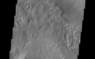 <h1>PIA06902:  Candor Chasma Landslide</h1><div class="PIA06902" lang="en" style="width:528px;text-align:left;margin:auto;background-color:#000;padding:10px;max-height:150px;overflow:auto;"><a href="/figures/PIA06902_fig1.jpg"> </a><br /><p>The Odyssey spacecraft has taken some great pictures of Valles Marineris, the largest canyon in the solar system. If this canyon were on Earth, it would stretch from New York to Los Angeles. For the next several weeks, the Image of the Day will tour some of the canyons that make up this vast system. We will start with Ius Chasma in the west, and end with Coprates Chasma to the east. For more information on Vallis Marineris, please see <a href="http://mars.jpl.nasa.gov/mep/science/vm.html">http://mars.jpl.nasa.gov/mep/science/vm.html</a>.</p><p>This image shows an area in Candor Chasma. Wind etched surfaces, dunes and layered rock are present in this area. A land slide can be seen on the left-center portion of this image. </p>Image information: VIS instrument. Latitude -8.1, Longitude 293.8 East (66.2 West). 19 meter/pixel resolution.</p><p>Note: this THEMIS visual image has not been radiometrically nor geometrically calibrated for this preliminary release. An empirical correction has been performed to remove instrumental effects. A linear shift has been applied in the cross-track and down-track direction to approximate spacecraft and planetary motion. Fully calibrated and geometrically projected images will be released through the Planetary Data System in accordance with Project policies at a later time.</p><p>NASA's Jet Propulsion Laboratory manages the 2001 Mars Odyssey mission for NASA's Office of Space Science, Washington, D.C. The Thermal Emission Imaging System (THEMIS) was developed by Arizona State University, Tempe, in collaboration with Raytheon Santa Barbara Remote Sensing. The THEMIS investigation is led by Dr. Philip Christensen at Arizona State University. Lockheed Martin Astronautics, Denver, is the prime contractor for the Odyssey project, and developed and built the orbiter. Mission operations are conducted jointly from Lockheed Martin and from JPL, a division of the California Institute of Technology in Pasadena.</p><br /><br /><a href="http://photojournal.jpl.nasa.gov/catalog/PIA06902" onclick="window.open(this.href); return false;" title="Voir l'image 	 PIA06902:  Candor Chasma Landslide	  sur le site de la NASA">Voir l'image 	 PIA06902:  Candor Chasma Landslide	  sur le site de la NASA.</a></div>