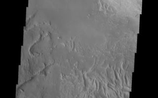 <h1>PIA06903:  Candor Chasma Landslides</h1><div class="PIA06903" lang="en" style="width:530px;text-align:left;margin:auto;background-color:#000;padding:10px;max-height:150px;overflow:auto;"><a href="/figures/PIA06903_fig1.jpg"> </a><br /><p>The Odyssey spacecraft has taken some great pictures of Valles Marineris, the largest canyon in the solar system. If this canyon were on Earth, it would stretch from New York to Los Angeles. For the next several weeks, the Image of the Day will tour some of the canyons that make up this vast system. We will start with Ius Chasma in the west, and end with Coprates Chasma to the east. For more information on Vallis Marineris, please see <a href="http://mars.jpl.nasa.gov/mep/science/vm.html">http://mars.jpl.nasa.gov/mep/science/vm.html</a>.</p><p>This image shows an area in Candor Chasma. In the bottom part of the image two large landslides are visible (in the center and at the right edge). The northern part of the image shows a large sand filled area.</p>Image information: VIS instrument. Latitude -8, Longitude 293.5 East (66.5 West). 19 meter/pixel resolution.</p><p>Note: this THEMIS visual image has not been radiometrically nor geometrically calibrated for this preliminary release. An empirical correction has been performed to remove instrumental effects. A linear shift has been applied in the cross-track and down-track direction to approximate spacecraft and planetary motion. Fully calibrated and geometrically projected images will be released through the Planetary Data System in accordance with Project policies at a later time.</p><p>NASA's Jet Propulsion Laboratory manages the 2001 Mars Odyssey mission for NASA's Office of Space Science, Washington, D.C. The Thermal Emission Imaging System (THEMIS) was developed by Arizona State University, Tempe, in collaboration with Raytheon Santa Barbara Remote Sensing. The THEMIS investigation is led by Dr. Philip Christensen at Arizona State University. Lockheed Martin Astronautics, Denver, is the prime contractor for the Odyssey project, and developed and built the orbiter. Mission operations are conducted jointly from Lockheed Martin and from JPL, a division of the California Institute of Technology in Pasadena.</p><br /><br /><a href="http://photojournal.jpl.nasa.gov/catalog/PIA06903" onclick="window.open(this.href); return false;" title="Voir l'image 	 PIA06903:  Candor Chasma Landslides	  sur le site de la NASA">Voir l'image 	 PIA06903:  Candor Chasma Landslides	  sur le site de la NASA.</a></div>