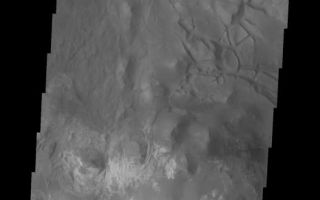 <h1>PIA06904:  Chaotic Candor Chasma</h1><div class="PIA06904" lang="en" style="width:527px;text-align:left;margin:auto;background-color:#000;padding:10px;max-height:150px;overflow:auto;"><a href="/figures/PIA06904_fig1.jpg"> </a><br /><p>The Odyssey spacecraft has taken some great pictures of Valles Marineris, the largest canyon in the solar system. If this canyon were on Earth, it would stretch from New York to Los Angeles. For the next several weeks, the Image of the Day will tour some of the canyons that make up this vast system. We will start with Ius Chasma in the west, and end with Coprates Chasma to the east. For more information on Vallis Marineris, please see <a href="http://mars.jpl.nasa.gov/mep/science/vm.html">http://mars.jpl.nasa.gov/mep/science/vm.html</a>.</p><p>This image shows an area in Candor Chasma. The Chasma walls and the chaotic canyon floor are visible on the top half of this image. The image's bottom half shows the slopes of the ridge formation in the middle of the Chasma. Wind etched surfaces and gullies are present there.</p>Image information: VIS instrument. Latitude -6.8, Longitude 292.5 East (67.5 West). 19 meter/pixel resolution.</p><p>Note: this THEMIS visual image has not been radiometrically nor geometrically calibrated for this preliminary release. An empirical correction has been performed to remove instrumental effects. A linear shift has been applied in the cross-track and down-track direction to approximate spacecraft and planetary motion. Fully calibrated and geometrically projected images will be released through the Planetary Data System in accordance with Project policies at a later time.</p><p>NASA's Jet Propulsion Laboratory manages the 2001 Mars Odyssey mission for NASA's Office of Space Science, Washington, D.C. The Thermal Emission Imaging System (THEMIS) was developed by Arizona State University, Tempe, in collaboration with Raytheon Santa Barbara Remote Sensing. The THEMIS investigation is led by Dr. Philip Christensen at Arizona State University. Lockheed Martin Astronautics, Denver, is the prime contractor for the Odyssey project, and developed and built the orbiter. Mission operations are conducted jointly from Lockheed Martin and from JPL, a division of the California Institute of Technology in Pasadena.</p><br /><br /><a href="http://photojournal.jpl.nasa.gov/catalog/PIA06904" onclick="window.open(this.href); return false;" title="Voir l'image 	 PIA06904:  Chaotic Candor Chasma	  sur le site de la NASA">Voir l'image 	 PIA06904:  Chaotic Candor Chasma	  sur le site de la NASA.</a></div>