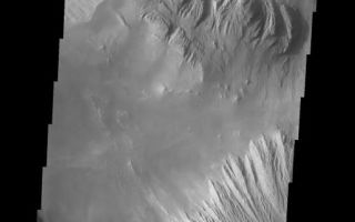 <h1>PIA06924:  Candor Chasma</h1><div class="PIA06924" lang="en" style="width:515px;text-align:left;margin:auto;background-color:#000;padding:10px;max-height:150px;overflow:auto;"><a href="/figures/PIA06924_fig1.jpg"> </a><br /><p>The Odyssey spacecraft has taken some great pictures of Valles Marineris, the largest canyon in the solar system. If this canyon were on Earth, it would stretch from New York to Los Angeles. For the next several weeks, the Image of the Day will tour some of the canyons that make up this vast system. We will start with Ius Chasma in the west, and end with Coprates Chasma to the east. For more information on Vallis Marineris, please see <a href="http://mars.jpl.nasa.gov/mep/science/vm.html">http://mars.jpl.nasa.gov/mep/science/vm.html</a>.</p><p>This image shows an area in Candor Chasma. A landslide can be seen on the image's top slopes. The bottom part of the image shows part of layered deposits that can be found in Candor Chasma.</p>Image information: VIS instrument. Latitude -7.6, Longitude 294.3 East (65.7 West). 19 meter/pixel resolution.</p><p>Note: this THEMIS visual image has not been radiometrically nor geometrically calibrated for this preliminary release. An empirical correction has been performed to remove instrumental effects. A linear shift has been applied in the cross-track and down-track direction to approximate spacecraft and planetary motion. Fully calibrated and geometrically projected images will be released through the Planetary Data System in accordance with Project policies at a later time.</p><p>NASA's Jet Propulsion Laboratory manages the 2001 Mars Odyssey mission for NASA's Office of Space Science, Washington, D.C. The Thermal Emission Imaging System (THEMIS) was developed by Arizona State University, Tempe, in collaboration with Raytheon Santa Barbara Remote Sensing. The THEMIS investigation is led by Dr. Philip Christensen at Arizona State University. Lockheed Martin Astronautics, Denver, is the prime contractor for the Odyssey project, and developed and built the orbiter. Mission operations are conducted jointly from Lockheed Martin and from JPL, a division of the California Institute of Technology in Pasadena.</p>NASA/JPL/Arizona State University<br /><br /><a href="http://photojournal.jpl.nasa.gov/catalog/PIA06924" onclick="window.open(this.href); return false;" title="Voir l'image 	 PIA06924:  Candor Chasma	  sur le site de la NASA">Voir l'image 	 PIA06924:  Candor Chasma	  sur le site de la NASA.</a></div>
