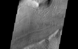 <h1>PIA06967:  Reull Vallis</h1><div class="PIA06967" lang="en" style="width:588px;text-align:left;margin:auto;background-color:#000;padding:10px;max-height:150px;overflow:auto;"><a href="/figures/PIA06967_fig1.jpg"> </a><br /><p>This week we will be examining images of Reull Vallis. Reull Vallis is located in the Martian southern highlands, just east of Hellas Basin. This extensive channel system records an interesting fluvial and mass wasting geologic history of the area. In many images show interesting patterns of mass wasted material in the bottom of the channel. For more information on the geology of Reull Vallis see <a href="http://viking.eps.pitt.edu/public/IcarusPub/Geol_RVR_Icarus.html">http://viking.eps.pitt.edu/public/IcarusPub/Geol_RVR_Icarus.html</a>.</p><p>Image information:VIS instrument. Latitude -42.1, Longitude 105.3 East (254.7 West). 19 meter/pixel resolution.</p><p>Note: this THEMIS visual image has not been radiometrically nor geometrically calibrated for this preliminary release. An empirical correction has been performed to remove instrumental effects. A linear shift has been applied in the cross-track and down-track direction to approximate spacecraft and planetary motion. Fully calibrated and geometrically projected images will be released through the Planetary Data System in accordance with Project policies at a later time.</p><p>NASA's Jet Propulsion Laboratory manages the 2001 Mars Odyssey mission for NASA's Office of Space Science, Washington, D.C. The Thermal Emission Imaging System (THEMIS) was developed by Arizona State University, Tempe, in collaboration with Raytheon Santa Barbara Remote Sensing. The THEMIS investigation is led by Dr. Philip Christensen at Arizona State University. Lockheed Martin Astronautics, Denver, is the prime contractor for the Odyssey project, and developed and built the orbiter. Mission operations are conducted jointly from Lockheed Martin and from JPL, a division of the California Institute of Technology in Pasadena.</p><br /><br /><a href="http://photojournal.jpl.nasa.gov/catalog/PIA06967" onclick="window.open(this.href); return false;" title="Voir l'image 	 PIA06967:  Reull Vallis	  sur le site de la NASA">Voir l'image 	 PIA06967:  Reull Vallis	  sur le site de la NASA.</a></div>