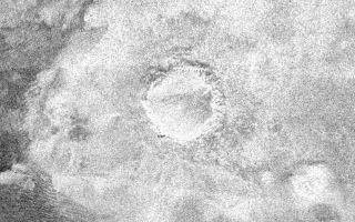 <h1>PIA07368:  Impact Crater with Ejecta Blanket</h1><div class="PIA07368" lang="en" style="width:800px;text-align:left;margin:auto;background-color:#000;padding:10px;max-height:150px;overflow:auto;"><p>This image shows a crater, approximately 60 kilometers (37 miles) in diameter, on the very eastern end of the radar image strip taken by the Cassini orbiter on its third close flyby of Titan on Feb. 15. </p><p>The appearance of the crater and the extremely bright (hence rough) blanket of material surrounding it is indicative of an origin by impact, in which a hypervelocity comet or asteroid, in this case, roughly 5-10 kilometers (3-6 miles) in size, slammed into the surface of Titan. </p><p>The bright surrounding blanket is debris, or ejecta, thrown out of the crater. The asymmetric appearance of this ejecta blanket could be an effect of atmospheric winds associated with the impact itself. Although clearly formed by impact, the feature lacks a central peak, suggesting that it has been eroded or otherwise modified after formation. Rainfall, wind erosion, and softening of the solid material in which the crater formed are all possible processes that might have altered this impact feature.</p><p>The Cassini-Huygens mission is a cooperative project of NASA, the European Space Agency and the Italian Space Agency. The Jet Propulsion Laboratory, a division of the California Institute of Technology in Pasadena, manages the Cassini-Huygens mission for NASA's Science Mission Directorate, Washington, D.C. The Cassini orbiter and its two onboard cameras were designed, developed and assembled at JPL. The radar instrument team is based at JPL, working with team members from the United States and several European countries. </p><p>For more information about the Cassini-Huygens mission visit <a href="http://saturn.jpl.nasa.gov">http://saturn.jpl.nasa.gov</a>.</p><br /><br /><a href="http://photojournal.jpl.nasa.gov/catalog/PIA07368" onclick="window.open(this.href); return false;" title="Voir l'image 	 PIA07368:  Impact Crater with Ejecta Blanket	  sur le site de la NASA">Voir l'image 	 PIA07368:  Impact Crater with Ejecta Blanket	  sur le site de la NASA.</a></div>
