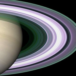 <h1>PIA07873:  Radio Occultation: Unraveling Saturn's Rings</h1><div class="PIA07873" lang="en" style="width:800px;text-align:left;margin:auto;background-color:#000;padding:10px;max-height:150px;overflow:auto;"><p>Specially designed Cassini orbits place Earth and Cassini on opposite sides of Saturn's rings, a geometry known as occultation. Cassini conducted the first radio occultation observation of Saturn's rings on May 3, 2005. </p><p>Three simultaneous radio signals of 0.94, 3.6, and 13 centimeter wavelength (Ka-, X-, and S-bands) were sent from Cassini through the rings to Earth. The observed change of each signal as Cassini moved behind the rings provided a profile of the distribution of ring material as a function of distance from Saturn, or an optical depth profile. </p><p>This simulated image was constructed from the measured optical depth profiles. It depicts the observed ring structure at about 10 kilometers (6 miles) in resolution. Color is used to represent information about ring particle sizes in different regions based on the measured effects of the three radio signals. </p><p>Purple color indicates regions where there is a lack of particles of size less than 5 centimeters (about 2 inches). Green and blue shades indicate regions where there are particles smaller than 5 centimeters (2 inches) and 1 centimeter (less than one third of one inch). The saturated broad white band near the middle of ring B is the densest region of ring B, over which two of the three radio signals were blocked at 10-kilometer (6-mile) resolution, preventing accurate color representation over this band. From other evidence in the radio observations, all ring regions appear to be populated by a broad range particle size distribution that extends to boulder sizes (several to many meters across). </p><p>The Cassini-Huygens mission is a cooperative project of NASA, the European Space Agency and the Italian Space Agency. The Jet Propulsion Laboratory, a division of the California Institute of Technology in Pasadena, manages the mission for NASA's Science Mission Directorate, Washington, D.C. The Cassini orbiter was designed, developed and assembled at JPL. The radio science team is based at JPL.</p><p>For more information about the Cassini-Huygens mission visit <a href="http://saturn.jpl.nasa.gov">http://saturn.jpl.nasa.gov</a>. For more information on the radio science team visit <a href="http://saturn.jpl.nasa.gov/spacecraft/instruments-cassini-rss.cfm">http://saturn.jpl.nasa.gov/spacecraft/instruments-cassini-rss.cfm</a>.</p><br /><br /><a href="http://photojournal.jpl.nasa.gov/catalog/PIA07873" onclick="window.open(this.href); return false;" title="Voir l'image 	 PIA07873:  Radio Occultation: Unraveling Saturn's Rings	  sur le site de la NASA">Voir l'image 	 PIA07873:  Radio Occultation: Unraveling Saturn's Rings	  sur le site de la NASA.</a></div>