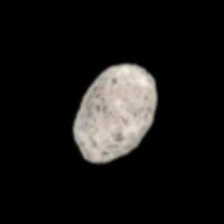 <h1>PIA08309:  Hyperion's Pitted Surface</h1><div class="PIA08309" lang="en" style="width:248px;text-align:left;margin:auto;background-color:#000;padding:10px;max-height:150px;overflow:auto;"><p>This color view of Hyperion shows off the dark pits that cover this strangely shaped moon. </p><p>At 280 kilometers (174 miles) across, Hyperion is the largest of Saturn's irregularly-shaped moons. See <a href="/catalog/PIA08240">PIA08240</a> for another color view.</p><p>Images taken using red, green and blue spectral filters were combined to create this natural color view. The images were obtained by the Cassini spacecraft narrow-angle camera on Oct. 10, 2006 at a distance of approximately 998,000 kilometers (620,000 miles) from Hyperion. Image scale is 6 kilometers (4 miles) per pixel.</p><p>The Cassini-Huygens mission is a cooperative project of NASA, the European Space Agency and the Italian Space Agency. The Jet Propulsion Laboratory, a division of the California Institute of Technology in Pasadena, manages the mission for NASA's Science Mission Directorate, Washington, D.C. The Cassini orbiter and its two onboard cameras were designed, developed and assembled at JPL. The imaging operations center is based at the Space Science Institute in Boulder, Colo.</p><p>For more information about the Cassini-Huygens mission visit <a href="http://saturn.jpl.nasa.gov">http://saturn.jpl.nasa.gov/home/index.cfm</a>. The Cassini imaging team homepage is at <a href="http://ciclops.org">http://ciclops.org</a>.</p><br /><br /><a href="http://photojournal.jpl.nasa.gov/catalog/PIA08309" onclick="window.open(this.href); return false;" title="Voir l'image 	 PIA08309:  Hyperion's Pitted Surface	  sur le site de la NASA">Voir l'image 	 PIA08309:  Hyperion's Pitted Surface	  sur le site de la NASA.</a></div>