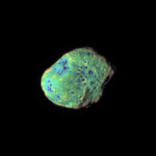 <h1>PIA08349:  Multicolor Hyperion</h1><div class="PIA08349" lang="en" style="width:400px;text-align:left;margin:auto;background-color:#000;padding:10px;max-height:150px;overflow:auto;"><p><a href="/archive/PIA08349.mov"></a><br />Click on the image for movie of<br />Multicolor Hyperion</p><p>Saturn's moon Hyperion appears to tumble toward Cassini in this movie that shows variations in color across the moon's surface.</p><p>The movie was created from 14 frames and represents about 12 hours as the spacecraft encountered Hyperion in early 2006. Most of the observable motion is due to the spacecraft's trajectory during the flyby.</p><p>The dark areas in the bottoms of craters are seen on all parts of Hyperion.</p><p>To create the false-color view in each frame, ultraviolet, green and infrared images were combined into a single picture that isolates and maps regional color differences. This "color map" was then superimposed over a clear-filter image that preserves the relative brightness across the body.</p><p>The combination of color map and brightness image shows how colors vary across Hyperion's surface. The origin of the color differences is not yet understood, but may be caused by subtle differences in the surface composition or the sizes of grains making up the icy surface material.</p><p>Hyperion is 280 kilometers (174 miles) across. The images were taken with the Cassini spacecraft narrow-angle camera on Feb. 23, 2006, at a distance ranging from 1.3 million to 1 million kilometers (800,000 to 600,000 miles) from Hyperion. Image scale is about 4 kilometers (2 miles) per pixel. </p><p>The Cassini-Huygens mission is a cooperative project of NASA, the European Space Agency and the Italian Space Agency. The Jet Propulsion Laboratory, a division of the California Institute of Technology in Pasadena, manages the mission for NASA's Science Mission Directorate, Washington, D.C. The Cassini orbiter and its two onboard cameras were designed, developed and assembled at JPL. The imaging operations center is based at the Space Science Institute in Boulder, Colo.</p><p>For more information about the Cassini-Huygens mission visit <a href="http://saturn.jpl.nasa.gov">http://saturn.jpl.nasa.gov/home/index.cfm</a>. The Cassini imaging team homepage is at <a href="http://ciclops.org">http://ciclops.org</a>.</p><br /><br /><a href="http://photojournal.jpl.nasa.gov/catalog/PIA08349" onclick="window.open(this.href); return false;" title="Voir l'image 	 PIA08349:  Multicolor Hyperion	  sur le site de la NASA">Voir l'image 	 PIA08349:  Multicolor Hyperion	  sur le site de la NASA.</a></div>