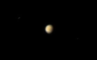<h1>PIA08899:  Hello Again, Jupiter!</h1><div class="PIA08899" lang="en" style="width:336px;text-align:left;margin:auto;background-color:#000;padding:10px;max-height:150px;overflow:auto;"><p>The brick red, white and brown cloud bands of Jupiter are seen here from Saturn orbit. The Cassini spacecraft's powerful imaging cameras were specially designed to photograph nearby bodies (cosmically speaking) in the Saturn system, but as this image demonstrates, the cameras are actually telescopes.</p><p>Jupiter is imaged here from more than 11 times the distance between Earth and the Sun, or slightly farther than the average Earth-Saturn distance. As demonstrated by <a href="/catalog/PIA08324">PIA08324</a>, Earth is only about a pixel across when viewed from Saturn by Cassini.</p><p>Cassini's parting glance at Jupiter, following the spacecraft's 2000 flyby and gravity assist, is <a href="/catalog/PIA03451">PIA03451</a>.</p><p>Images taken using red, green and blue spectral filters were combined to create this natural color view. The images were taken with the Cassini spacecraft narrow-angle camera on Feb. 8, 2007 at a distance of approximately 1.8 billion kilometers (1.1 billion miles) from Jupiter and at a Sun-Jupiter-spacecraft, or phase, angle of 50 degrees. Scale in the original image was about 10,000 kilometers (6,000 miles) per pixel. The image was contrast enhanced and magnified by a factor of two and a half to enhance the visibility of cloud features on the planet.</p><p>The Cassini-Huygens mission is a cooperative project of NASA, the European Space Agency and the Italian Space Agency. The Jet Propulsion Laboratory, a division of the California Institute of Technology in Pasadena, manages the mission for NASA's Science Mission Directorate, Washington, D.C. The Cassini orbiter and its two onboard cameras were designed, developed and assembled at JPL. The imaging operations center is based at the Space Science Institute in Boulder, Colo.</p><p>For more information about the Cassini-Huygens mission visit <a href="http://saturn.jpl.nasa.gov">http://saturn.jpl.nasa.gov/home/index.cfm</a>. The Cassini imaging team homepage is at <a href="http://ciclops.org">http://ciclops.org</a>.</p><br /><br /><a href="http://photojournal.jpl.nasa.gov/catalog/PIA08899" onclick="window.open(this.href); return false;" title="Voir l'image 	 PIA08899:  Hello Again, Jupiter!	  sur le site de la NASA">Voir l'image 	 PIA08899:  Hello Again, Jupiter!	  sur le site de la NASA.</a></div>