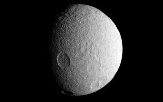 <h1>PIA09723:  History on Tethys</h1><div class="PIA09723" lang="en" style="width:689px;text-align:left;margin:auto;background-color:#000;padding:10px;max-height:150px;overflow:auto;"><p>The Cassini spacecraft spies four large impact basins on the southern hemisphere of icy Tethys.</p><p>Tethys (1,071 kilometers, or 665 miles across), like the other airless worlds of the Solar System, wears the record of countless impacts experienced over the eons.</p><p>Lit terrain seen here is on the leading hemisphere of Tethys. North is up and rotated 15 degrees to the left.</p><p>The image was taken in visible light with the Cassini spacecraft narrow-angle camera on July 21, 2007. The view was obtained at a distance of approximately 452,000 kilometers (281,000 miles) from Tethys and at a Sun-Tethys-spacecraft, or phase, angle of 54 degrees. Image scale is 3 kilometers (2 miles) per pixel.</p><p>The Cassini-Huygens mission is a cooperative project of NASA, the European Space Agency and the Italian Space Agency.  The Jet Propulsion Laboratory, a division of the California Institute of Technology in Pasadena, manages the mission for NASA's Science Mission Directorate, Washington, D.C. The Cassini orbiter and its two onboard cameras were designed, developed and assembled at JPL.  The imaging operations center is based at the Space Science Institute in Boulder, Colo.</p><p>For more information about the Cassini-Huygens mission visit <a href="http://saturn.jpl.nasa.gov">http://saturn.jpl.nasa.gov/home/index.cfm</a>. The Cassini imaging team homepage is at <a href="http://ciclops.org">http://ciclops.org</a>.</p><br /><br /><a href="http://photojournal.jpl.nasa.gov/catalog/PIA09723" onclick="window.open(this.href); return false;" title="Voir l'image 	 PIA09723:  History on Tethys	  sur le site de la NASA">Voir l'image 	 PIA09723:  History on Tethys	  sur le site de la NASA.</a></div>