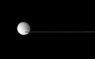 <h1>PIA09727:  Crossing Dione</h1><div class="PIA09727" lang="en" style="width:659px;text-align:left;margin:auto;background-color:#000;padding:10px;max-height:150px;overflow:auto;"><p>Saturn's nearly edge-on rings are caught between two moons.</p><p>The edge of the F ring has a blurred appearance with bright Dione (1,126 kilometers, or 700 miles across) as a backdrop. Oblong Pandora (84 kilometers, or 52 miles across) transits Dione and heads off toward right.</p><p>This view looks toward the unilluminated side of the rings from less than a degree above the ringplane.</p><p>The image was taken in visible green light with the Cassini spacecraft narrow-angle camera on July 24, 2007. The view was acquired at a distance of approximately 2.2 million kilometers (1.4 million miles) from Dione at an image scale of about 13 kilometers (8 miles) per pixel.</p><p>The Cassini-Huygens mission is a cooperative project of NASA, the European Space Agency and the Italian Space Agency.  The Jet Propulsion Laboratory, a division of the California Institute of Technology in Pasadena, manages the mission for NASA's Science Mission Directorate, Washington, D.C. The Cassini orbiter and its two onboard cameras were designed, developed and assembled at JPL.  The imaging operations center is based at the Space Science Institute in Boulder, Colo.</p><p>For more information about the Cassini-Huygens mission visit <a href="http://saturn.jpl.nasa.gov">http://saturn.jpl.nasa.gov/home/index.cfm</a>. The Cassini imaging team homepage is at <a href="http://ciclops.org">http://ciclops.org</a>.</p><br /><br /><a href="http://photojournal.jpl.nasa.gov/catalog/PIA09727" onclick="window.open(this.href); return false;" title="Voir l'image 	 PIA09727:  Crossing Dione	  sur le site de la NASA">Voir l'image 	 PIA09727:  Crossing Dione	  sur le site de la NASA.</a></div>