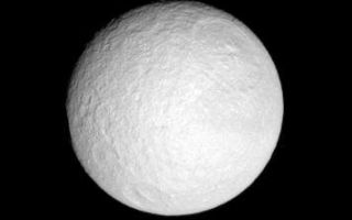 <h1>PIA09781:  Toward Tethys</h1><div class="PIA09781" lang="en" style="width:356px;text-align:left;margin:auto;background-color:#000;padding:10px;max-height:150px;overflow:auto;"><p>Tethys hangs before the Cassini spacecraft, its great crater Odysseus in view. </p><p>See <a href="/catalog/PIA07693">PIA07693</a> for a close-up view of Odysseus.</p><p>This view looks toward the anti-Saturn hemisphere of Tethys (1,071 kilometers, or 665 miles across). North is up.</p><p>The image was taken with the Cassini spacecraft narrow-angle camera on Oct. 25, 2007 using a spectral filter sensitive to wavelengths of infrared light centered at 752 nanometers. The view was obtained at a distance of approximately 798,000 kilometers (496,000 miles) from Tethys and at a Sun-Tethys-spacecraft, or phase, angle of 12 degrees. Image scale is 5 kilometers (3 miles) per pixel.</p><p>The Cassini-Huygens mission is a cooperative project of NASA, the European Space Agency and the Italian Space Agency. The Jet Propulsion Laboratory, a division of the California Institute of Technology in Pasadena, manages the mission for NASA's Science Mission Directorate, Washington, D.C. The Cassini orbiter and its two onboard cameras were designed, developed and assembled at JPL. The imaging operations center is based at the Space Science Institute in Boulder, Colo.</p><p>For more information about the Cassini-Huygens mission visit <a href="http://saturn.jpl.nasa.gov">http://saturn.jpl.nasa.gov/home/index.cfm</a>. The Cassini imaging team homepage is at <a href="http://ciclops.org">http://ciclops.org</a>.<br /><br /><a href="http://photojournal.jpl.nasa.gov/catalog/PIA09781" onclick="window.open(this.href); return false;" title="Voir l'image 	 PIA09781:  Toward Tethys	  sur le site de la NASA">Voir l'image 	 PIA09781:  Toward Tethys	  sur le site de la NASA.</a></div>