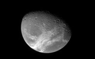 <h1>PIA09838:  Dione Below</h1><div class="PIA09838" lang="en" style="width:368px;text-align:left;margin:auto;background-color:#000;padding:10px;max-height:150px;overflow:auto;"><p>The Cassini spacecraft looks down from high latitude over Dione and the system of wispy fractures that coats the moon's trailing side.</p><p>This view looks toward Dione (1,126 kilometers, or 700 miles across) from 43 degrees above the equator. North is up.</p><p>The image was taken in visible light with the Cassini spacecraft narrow-angle camera on Jan. 14, 2008. The view was acquired at a distance of approximately 938,000 kilometers (583,000 miles) from Dione and at a Sun-Dione-spacecraft, or phase, angle of 54 degrees. Image scale is 6 kilometers (4 miles) per pixel.</p><p>The Cassini-Huygens mission is a cooperative project of NASA, the European Space Agency and the Italian Space Agency. The Jet Propulsion Laboratory, a division of the California Institute of Technology in Pasadena, manages the mission for NASA's Science Mission Directorate, Washington, D.C. The Cassini orbiter and its two onboard cameras were designed, developed and assembled at JPL. The imaging operations center is based at the Space Science Institute in Boulder, Colo.</p><p>For more information about the Cassini-Huygens mission visit <a href="http://saturn.jpl.nasa.gov">http://saturn.jpl.nasa.gov/home/index.cfm</a>. The Cassini imaging team homepage is at <a href="http://ciclops.org">http://ciclops.org</a>.<br /><br /><a href="http://photojournal.jpl.nasa.gov/catalog/PIA09838" onclick="window.open(this.href); return false;" title="Voir l'image 	 PIA09838:  Dione Below	  sur le site de la NASA">Voir l'image 	 PIA09838:  Dione Below	  sur le site de la NASA.</a></div>