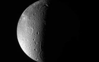 <h1>PIA09886:  Dione: North Polar View</h1><div class="PIA09886" lang="en" style="width:444px;text-align:left;margin:auto;background-color:#000;padding:10px;max-height:150px;overflow:auto;"><p>The Cassini spacecraft looks down, almost directly at the north pole of Dione. The feature just left of the terminator at bottom is Janiculum Dorsa, a long, roughly north-south trending ridge.</p><p>Lit terrain seen here is on the anti-Saturn and trailing sides of Dione (1,126 kilometers, or 700 miles across).The image was taken with the Cassini spacecraft narrow-angle camera on March 22, 2008 using a spectral filter sensitive to wavelengths of ultraviolet light centered at 338 nanometers. The view was acquired at a distance of approximately 650,000 kilometers (404,000 miles) from Dione and at a Sun-Dione-spacecraft, or phase, angle of 99 degrees. Image scale is 4 kilometers (2 miles) per pixel.</p><p>The Cassini-Huygens mission is a cooperative project of NASA, the European Space Agency and the Italian Space Agency. The Jet Propulsion Laboratory, a division of the California Institute of Technology in Pasadena, manages the mission for NASA's Science Mission Directorate, Washington, D.C. The Cassini orbiter and its two onboard cameras were designed, developed and assembled at JPL. The imaging operations center is based at the Space Science Institute in Boulder, Colo.</p><p>For more information about the Cassini-Huygens mission visit <a href="http://saturn.jpl.nasa.gov" class="external free" target="wpext">http://saturn.jpl.nasa.gov/</a>. The Cassini imaging team homepage is at <a href="http://ciclops.org" class="external free" target="wpext">http://ciclops.org</a>.<br /><br /><a href="http://photojournal.jpl.nasa.gov/catalog/PIA09886" onclick="window.open(this.href); return false;" title="Voir l'image 	 PIA09886:  Dione: North Polar View	  sur le site de la NASA">Voir l'image 	 PIA09886:  Dione: North Polar View	  sur le site de la NASA.</a></div>