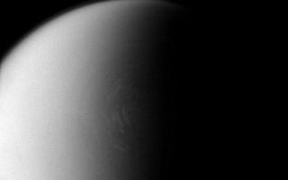 <h1>PIA10434:  Polar Clouds on Titan</h1><div class="PIA10434" lang="en" style="width:800px;text-align:left;margin:auto;background-color:#000;padding:10px;max-height:150px;overflow:auto;"><p>Frigid Titan continues to prove itself a remarkably complex and dynamic world. Here, bright clouds are seen encircling the moon's north polar region. </p><p>The Cassini spacecraft has revealed the presence of great lakes and seas of liquid hydrocarbons on this part of Titan's surface (see <a href="/catalog/PIA08365">PIA08365</a> and <a href="/catalog/PIA08930">PIA08930</a>). An extended, high-altitude haze hovers above the limb of Titan (5,150 kilometers, or 3,200 miles across) at top of the image.</p><p>The image was taken with the Cassini spacecraft narrow-angle camera on April 26, 2008 using a spectral filter sensitive to wavelengths of infrared light centered at 938 nanometers. The view was acquired at a distance of approximately 786,000 kilometers (488,000 miles) from Titan. Image scale is 5 kilometers (3 miles) per pixel.</p><p>The Cassini-Huygens mission is a cooperative project of NASA, the European Space Agency and the Italian Space Agency. The Jet Propulsion Laboratory, a division of the California Institute of Technology in Pasadena, manages the mission for NASA's Science Mission Directorate, Washington, D.C. The Cassini orbiter and its two onboard cameras were designed, developed and assembled at JPL. The imaging operations center is based at the Space Science Institute in Boulder, Colo.</p><p>For more information about the Cassini-Huygens mission visit <a href="http://saturn.jpl.nasa.gov" class="external free" target="wpext">http://saturn.jpl.nasa.gov/</a>. The Cassini imaging team homepage is at <a href="http://ciclops.org" class="external free" target="wpext">http://ciclops.org</a>.<br /><br /><a href="http://photojournal.jpl.nasa.gov/catalog/PIA10434" onclick="window.open(this.href); return false;" title="Voir l'image 	 PIA10434:  Polar Clouds on Titan	  sur le site de la NASA">Voir l'image 	 PIA10434:  Polar Clouds on Titan	  sur le site de la NASA.</a></div>